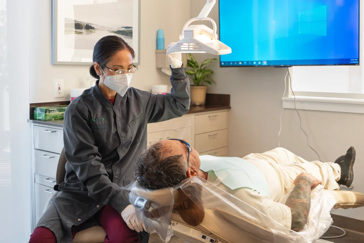 Woman with natural, confident smile after cosmetic dentistry