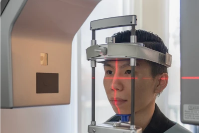 Doctor talking to the patient in need of emergency dentistry