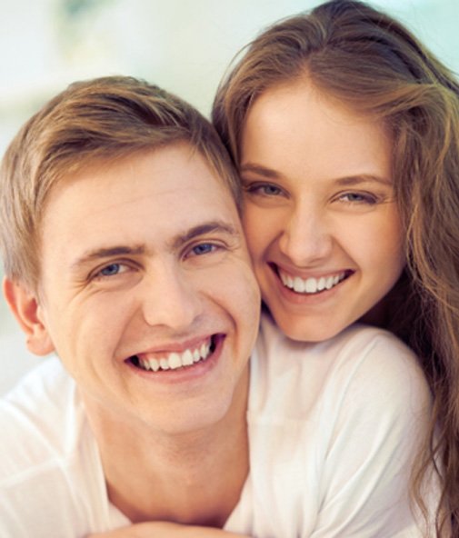 couple smiling after dental bonding in Los Gatos