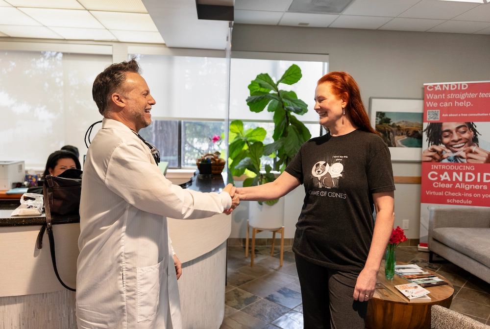 woman smiling after joining the Los Gatos Dental Group savings plan