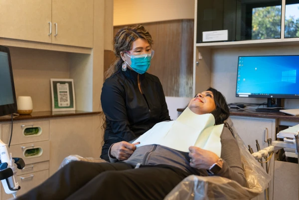 Patient smile after professional teeth whitening treatment