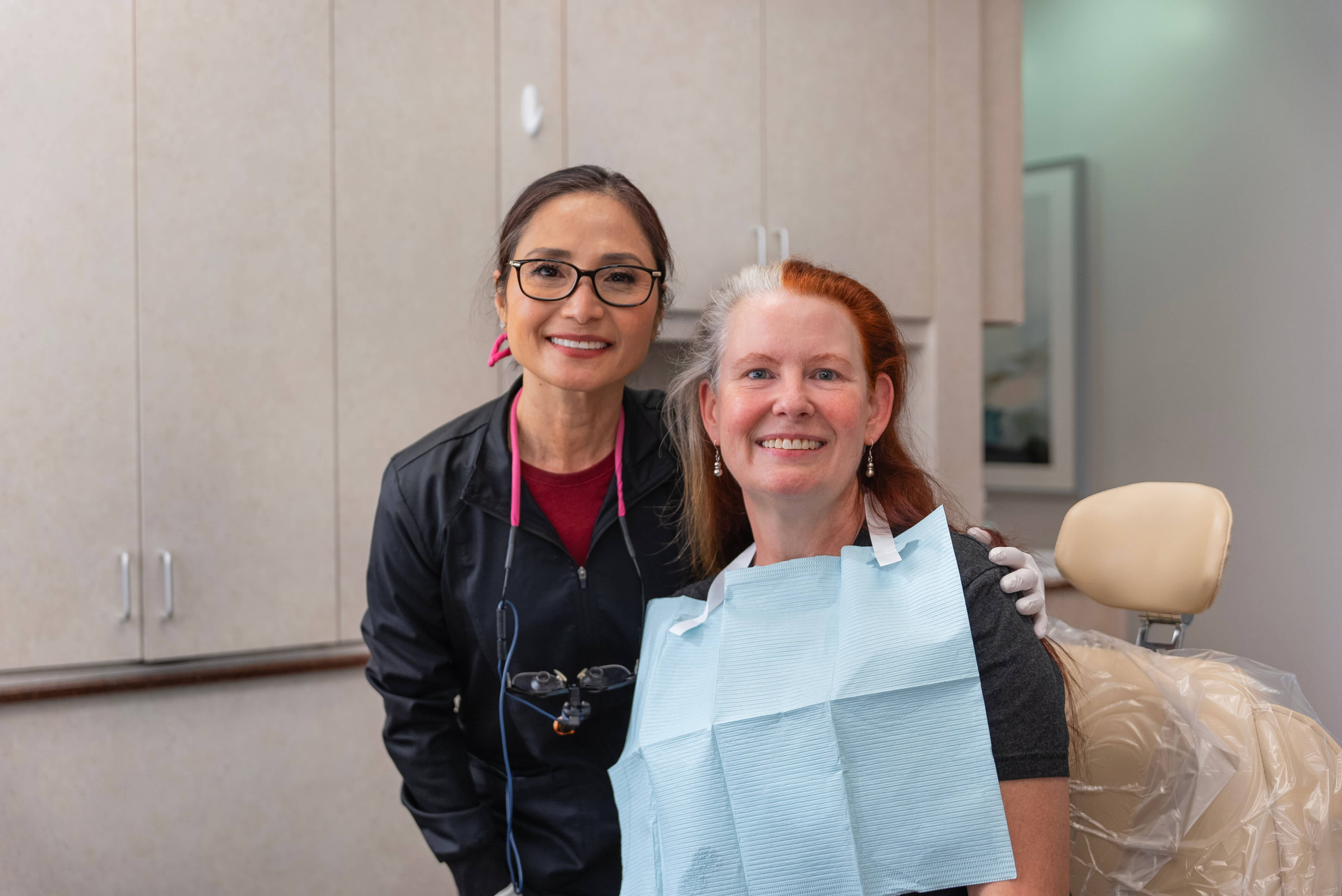 Man in need of T M J therapy holding his jaw