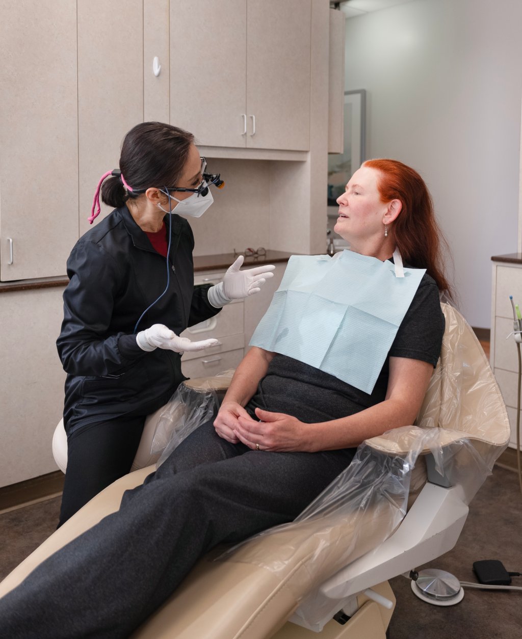 Smiling woman visiting her emergency dentist in Los Gatos, CA